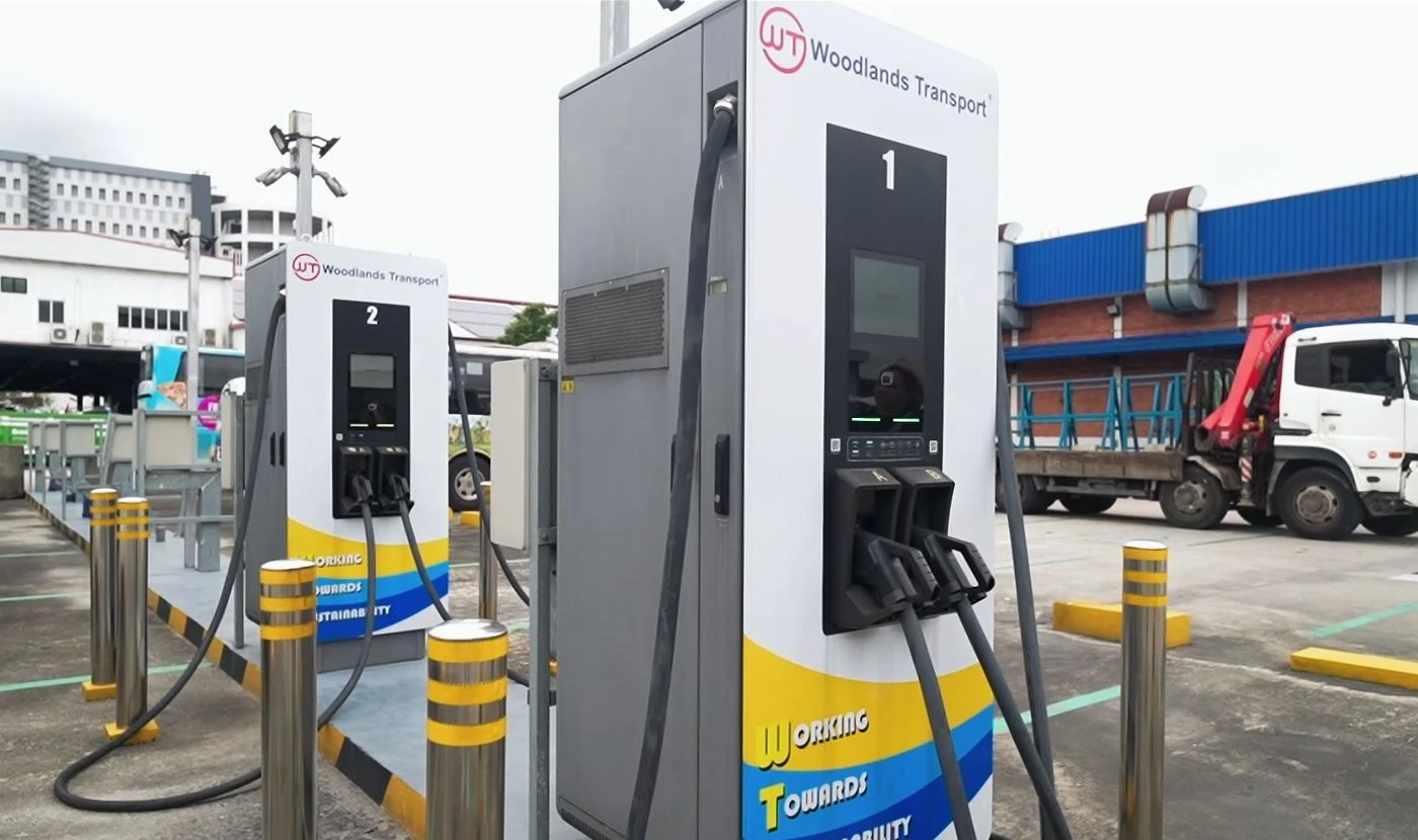 Woodlands-branded commercial charging stations at the fleet depot