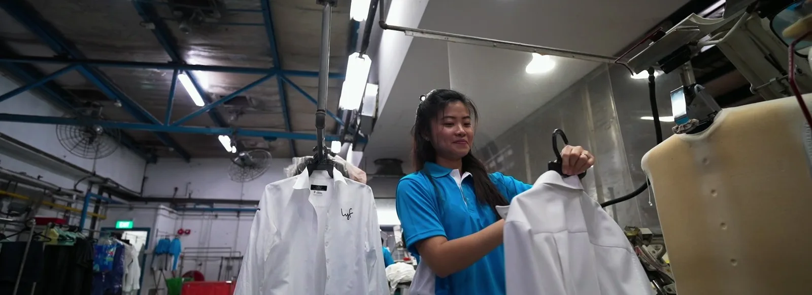 Flash Laundry colleagues preparing garments